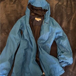 Columbia blue kids size 14/16 rain jacket, perfect condition